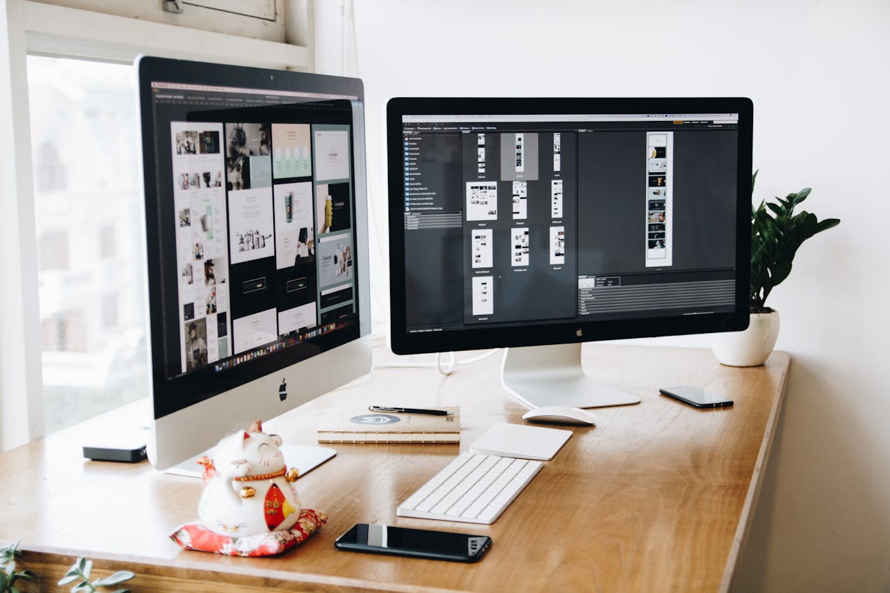 Mastering the First Impression: Your intriguing post title goes here A well-organized design workspace with dual monitors and design software on display.